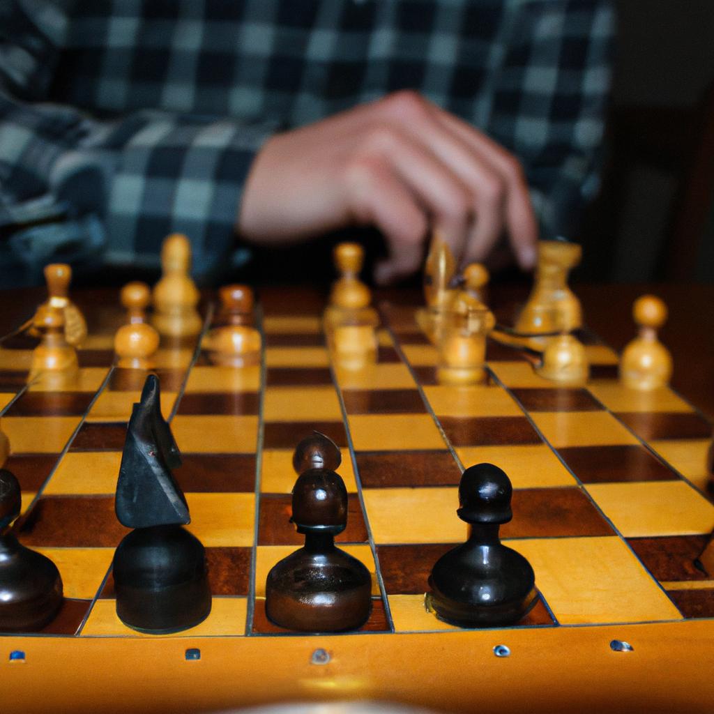 Person playing chess, studying moves