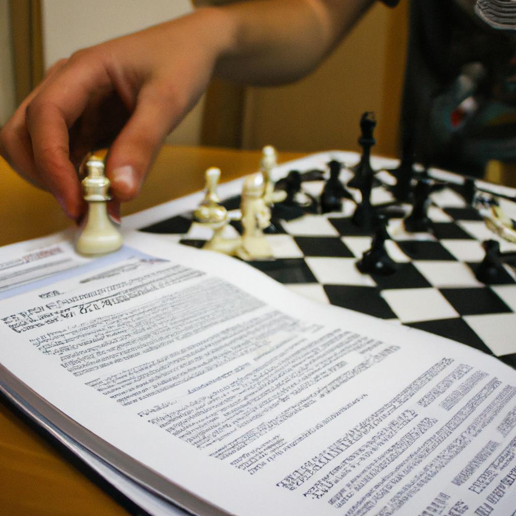Person studying chess rule book