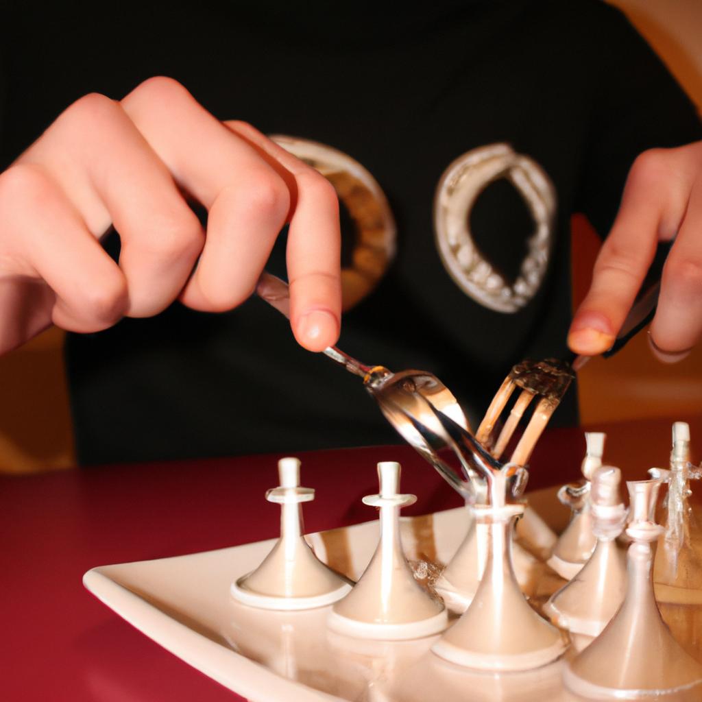 Person playing chess with forks